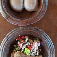 Pâte noire (télibô) + Légume (tchayo) (2.000 F) and Poulet (500 F) at Vegan Suma in Porto-novo