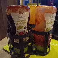 4 kinds of complementary vegan sauces (BBQ, ketchup, mayo, orange-mustard) at Hans im Glück - Wien Am Belvedere in Vienna
