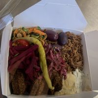 Falafel box with humus, mussaka… and different vegetables and sauces  at ELA  in Chamonix-mont-blanc