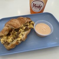 Breakfast croissant and iced teaa  at The Moody Vegan in Los Angeles