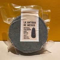 Tortillas de maiz  de maiz chalqueño Azul nixtamalizadas y molidas en molino de piedra por nosotros   at La Antigua de México in Barcelona