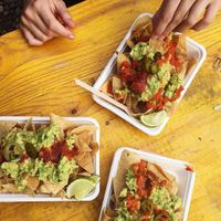 Guacamole con nuestros totopos artesanos cortados a cuchillo  at La Antigua de México in Barcelona
