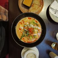 vegan red curry, sticky rice and roti with satay sauce at Siam in New Plymouth