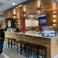 Full view of kitchen while food is prepared. Can seat at the countertop, or at one of the many tables around the Resturant  #Veganuary at Plants & Poets Cafe in Newark