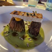 Pea and mint gazpacho, zucchini flowers stuffed with edamame wasabi with sunflower seed and turmeric pesto at Ristorante dei Poeti in Sirmione