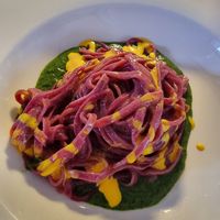 Legacci with red turnip on arugula cream with coconut and saffron dressing at Ristorante dei Poeti in Sirmione