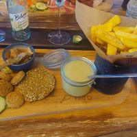 Grilled legumes, fresh cold greens, falafel, kale quinoa burger, soup, sweet potato fries or regular fries (I traded aome with a friend). The soup was amazing! at L'Endroit in Malmedy