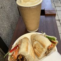 “Mango delight" smoothie and “bahn mi bon appetit”  at O Plant-based - Nguyễn Đình Chiểu in Ho Chi Minh City