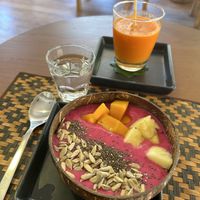 Smoothiebowl and fresh juice  at Grasshopper Cafe in Luang Prabang