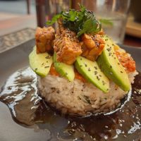 Tempeh-avocado on rice bed at Grasshopper Cafe in Luang Prabang