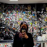 Downstairs... Amazing stickers collection at Prime Dog - Vila Mariana in Sao Paulo