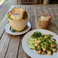 Laab salad, coconut juice, sticky rice at Phakhao Lao Restaurant in Vientiane