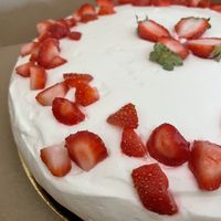 Chocolate, vanilla and strawberry vegan cake (upon request).  at El Pequeño Aprendiz - Café Atelier in Totana