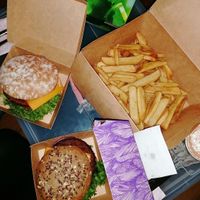 Vegan burger and fries takeout at Hans im Glück in Wuppertal