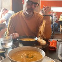 Roasted tomato and coriander soup with bread. Cheap and delicious !  at Orange Cafe Bar in Mousehole