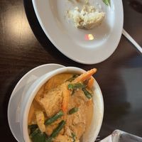 Pineapple curry with tofu, zucchini, carrot, string beans, bell peppers, basil, and red curry paste blended with coconut oil and crushed pineapple with a side of jasmine rice  at Acasia Thai Restaurant in Phillipsburg