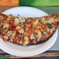 Avatara at the stampede, special 'cowboy' pizza with mushrooms, pineapple, sundried and fresh tomatoes, and daiya cheese at Avatara Pizza in Calgary