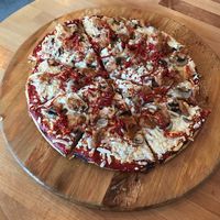 Tomato sauce, vegan cheese, beyond meat, sun dried tomatoes, and mushrooms superrrrr good 😋 at Avatara Pizza in Calgary