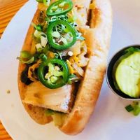 banh mi with fried tofu, chipotle mayo, kimchi, cilantro, scallions, jalepenos (with obligatory side pickle) at Cleveland Vegan in Lakewood