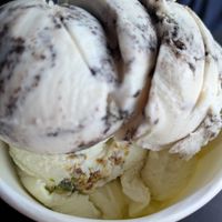 Top scoop is cookies and cream bottom is pistachio at Scoop LV in Las Vegas