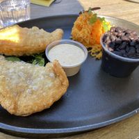 Vegan Breakfast Empanada Skillet
2 Empanadas filled w/Soyrizo, Just “Egg”, Potatoes. Served w/ Rice, Beans & Harissa Aioli  at Makers & Finders - Henderson in Henderson