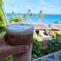 Cappuccino with oat milk and sea-view at PRANA Cafe Holistic Food in Koh Tao