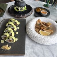 Charcoal & Avo Burger, Teriyaki Mushroom Sugi & Calamari  at Plant Bistro in Ubud