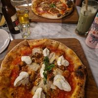 Pizzas - pepperoni at the back mine was Marscapone and sausage at Plant Bistro in Ubud