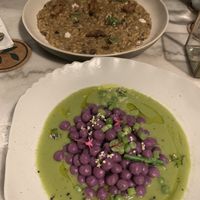 four mushroom risotto which they smoked with rosemary at our table, gnocchi with asparagus and peas   at Plant Bistro in Ubud