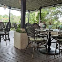 Tables around the edge overlook the surrounding areaa  at Plant Bistro in Ubud
