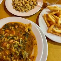 Soup, baked beans and fries at Trattoria Da Leo in Lucca