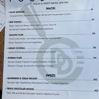 Snack menu - vegan items marked with leaf  at Dram & Draught in Cary