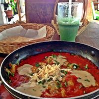 Vegan Casserole with Eggplant, Tahini and Grated Tofu with a Spirulina Green Smoothie.  at Bio & Natural - Con Constituyentes in Playa Del Carmen