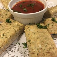 Garlic toast with homemade vegan ricotta  at Pizza Luce - Lyndale Ave in Minneapolis