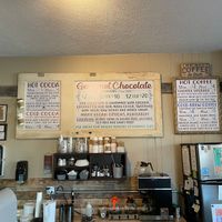 Display for drink options. Hot and cold coffee, non-dairy milk, and ice cream available. at Oh Mi Organics in St Johns
