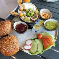 Vegan breakfast (9.20) with fruit salad, hummus and avocado spread at Lorösch in Bad Orb