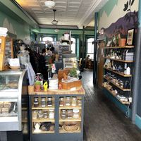 Seating & bathroom in the back  at Superfresh Organic Cafe in Brattleboro
