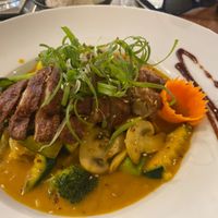 Yellow curry with seitan  at Vevi Restaurant III in Vienna