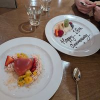Terragon Peach Mousse desert and complimentary non vegan dessert for my husband for an anniversary at Peak Fine Restaurant in Vernon