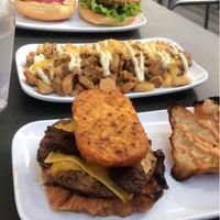 B.A.D. Burger, loaded breakfast potatoes, and the GBK burger at Green Bar and Kitchen in Fort Lauderdale