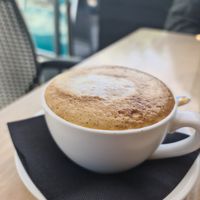 Almond milk latte at COFFEE 8 in Williamstown