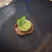 Amuse-buche (a cracker with guacamole?)  at LaFrida Restaurant in Cabo San Lucas