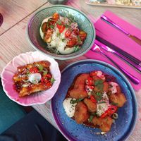 Bao buns, tteokbokkit and cauliflower fritters. at Funky Woo in Tampere