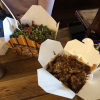 Veggie poutine and vegan poutine  at The Big Cheese Poutinerie - 17 Ave in Calgary