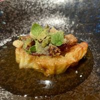 Seared cabbage, smoked tomato broth, caramelized onion and croutonss  at Wolfs Junge in Hamburg