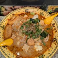 They top it with mustard stem and crispy lentils at Dragon Hot Pot in Carlton
