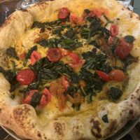 Pizza girasole con aggiunta cicoria (senza mozzarella)  at Pizzeria Wood in Pescara