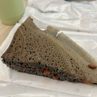 Charcoal pancake with biscoff filling   at Munchi Pancakes in Central Singapore