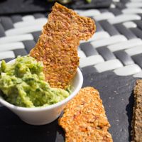 Crackers and guacamole at Nama Artisan Raw Foods in West London