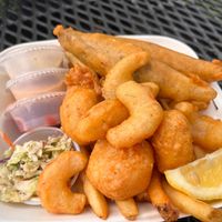 Platter (Cod, Shrimp, scallops, cole slaw, fries, and sauces) at Oh My Cod - Vegan Seafood in Palm Coast